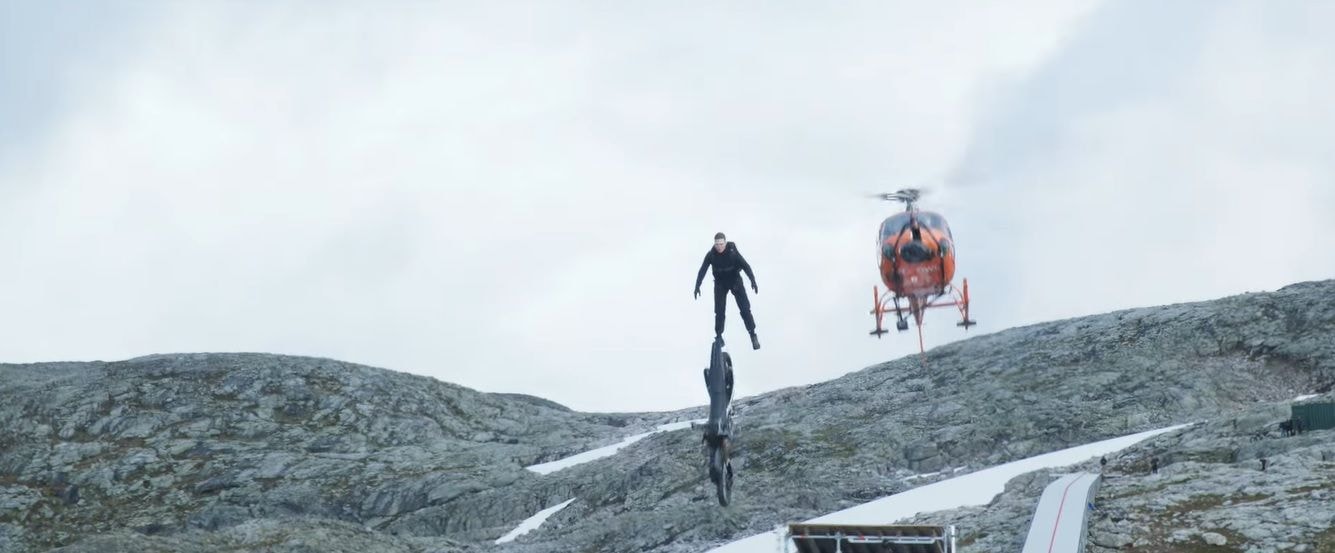 Tom Cruise Rides A Motorcycle Off A Cliff In ‘Mission Impossible: Dead Reckoning’ Tom Cruise Rides A Motorcycle Off A Cliff In ‘Mission Impossible: Dead Reckoning’