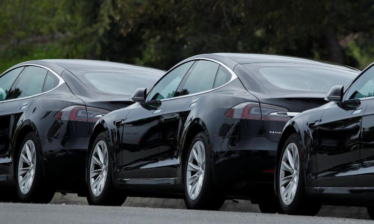 Tesla Inc is expected to report the slowest sales growth in 10 quarters