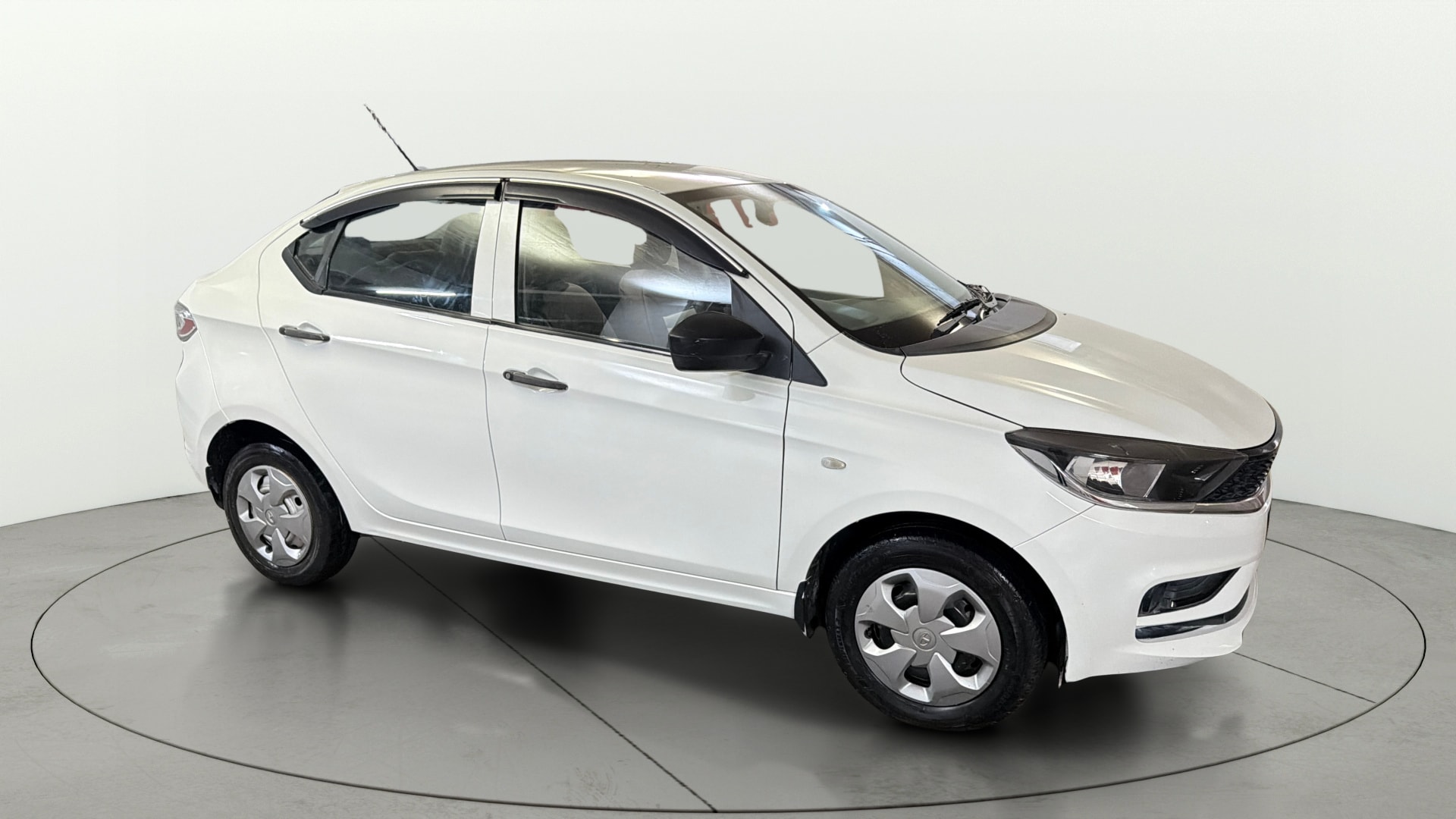 View 2022 Tata Tigor XE Diesel Image 21 Used 2022 Tata Tigor XE Diesel Image 21