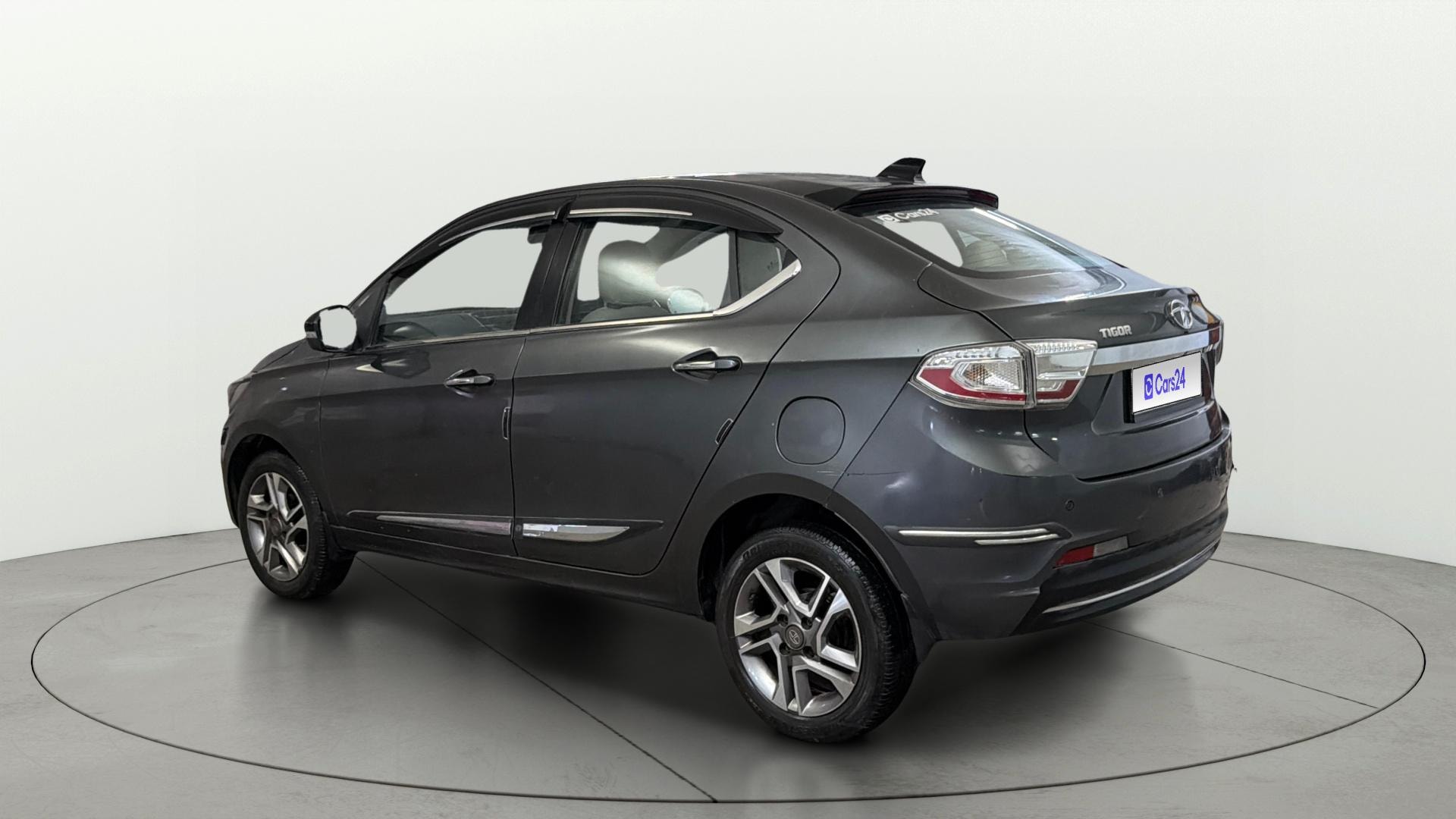 View 2023 Tata Tigor XE Diesel Image 2 Used 2023 Tata Tigor XE Diesel Image 2