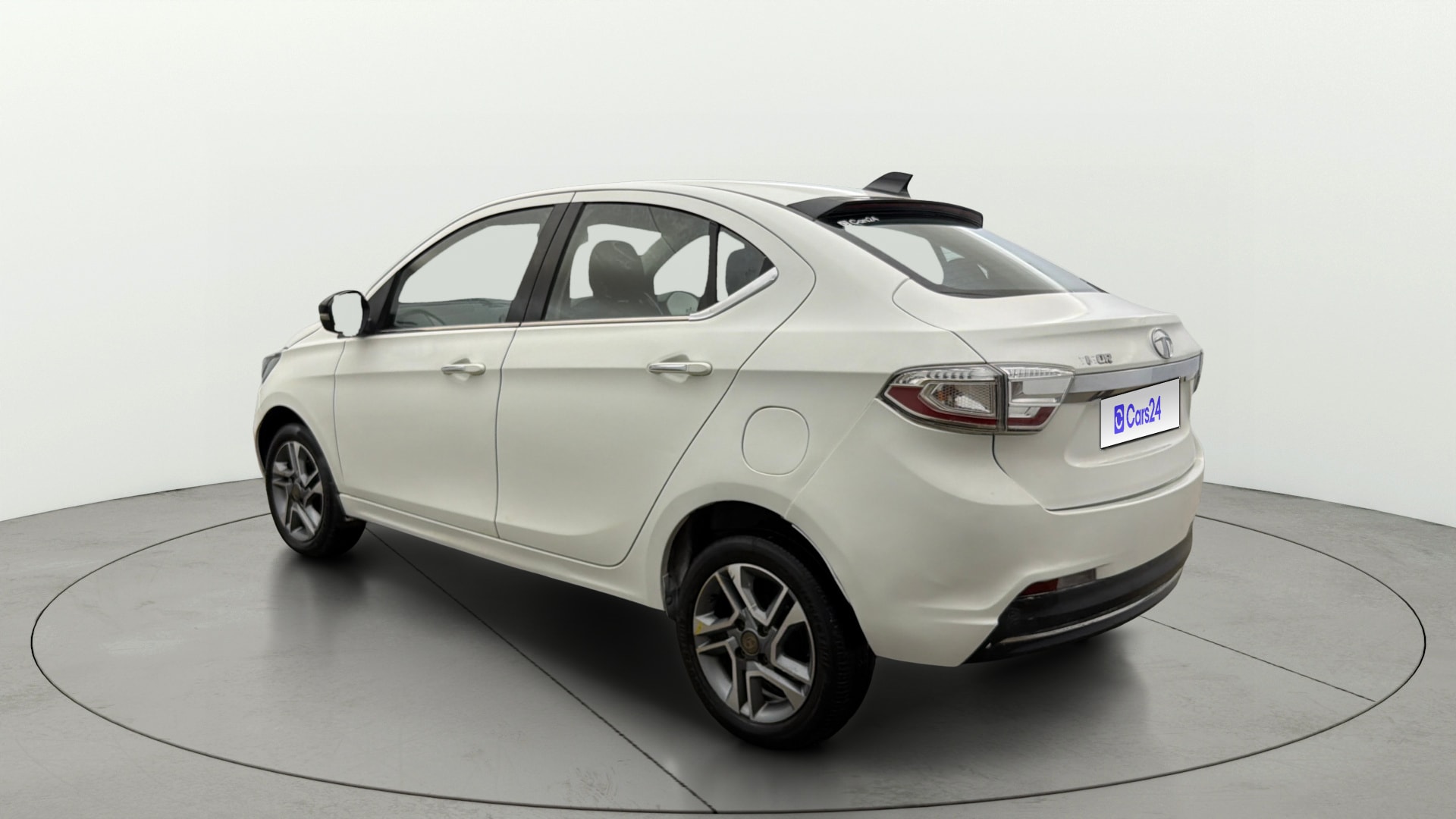 View 2023 Tata Tigor XE Diesel Image 2 Used 2023 Tata Tigor XE Diesel Image 2