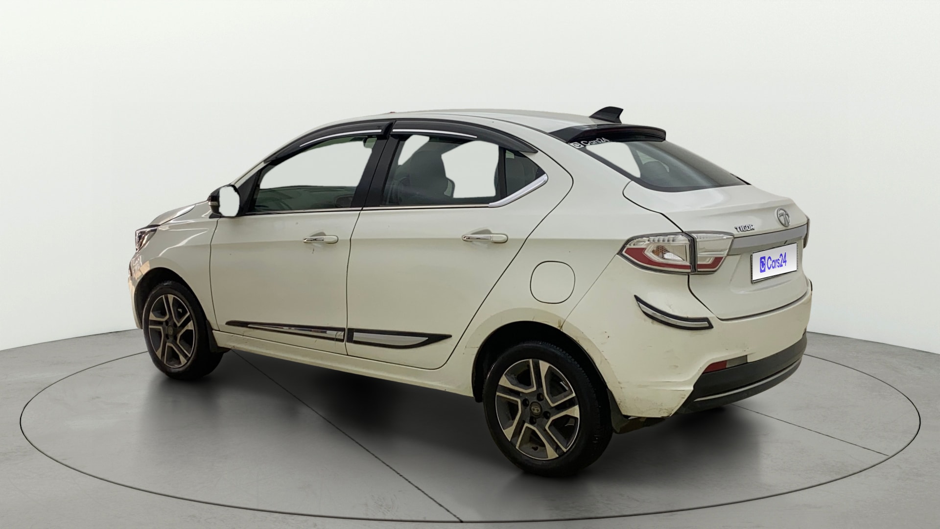 View 2022 Tata Tigor XE Diesel Image 2 Used 2022 Tata Tigor XE Diesel Image 2