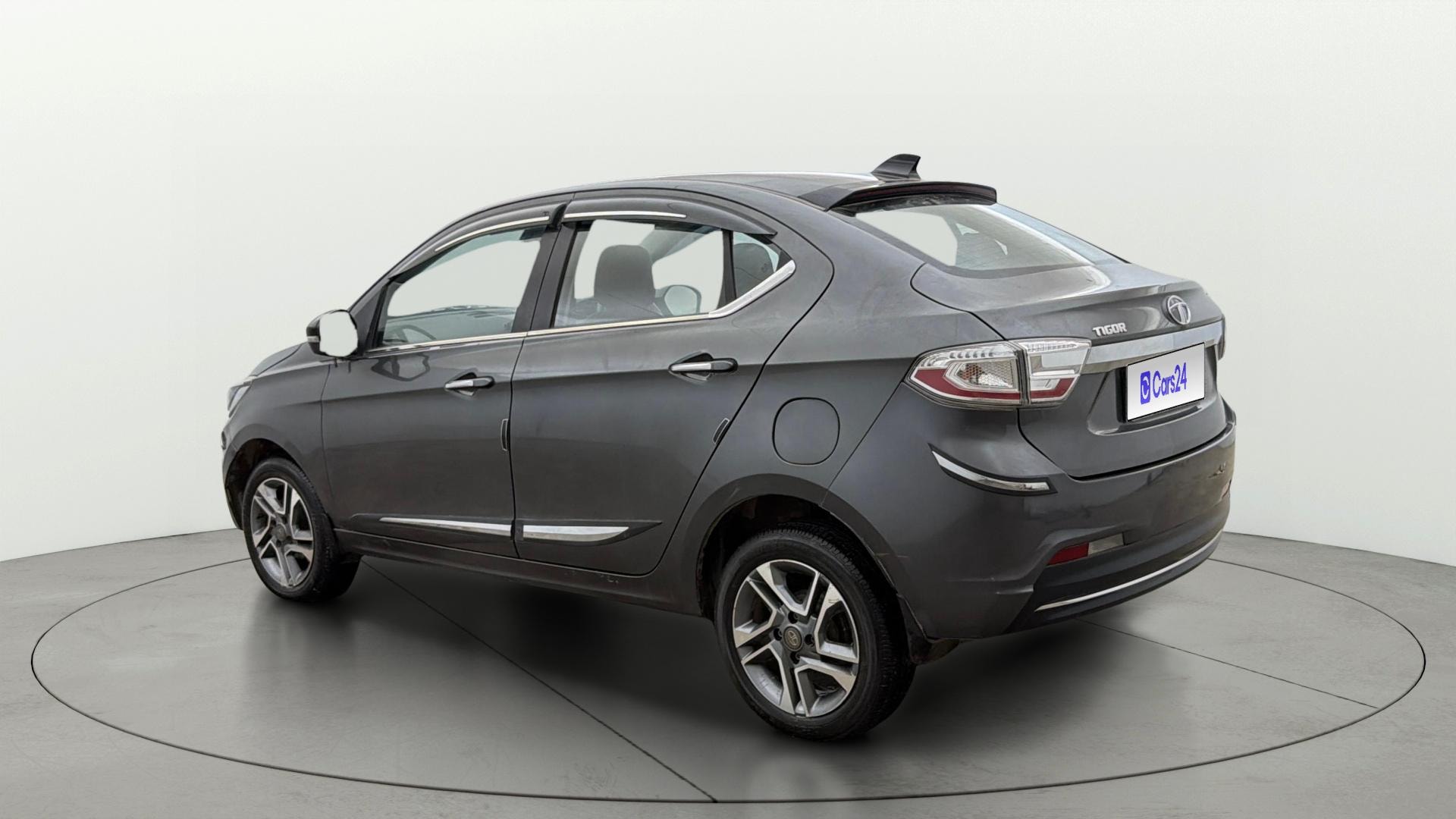 View 2023 Tata Tigor XE Diesel Image 2 Used 2023 Tata Tigor XE Diesel Image 2