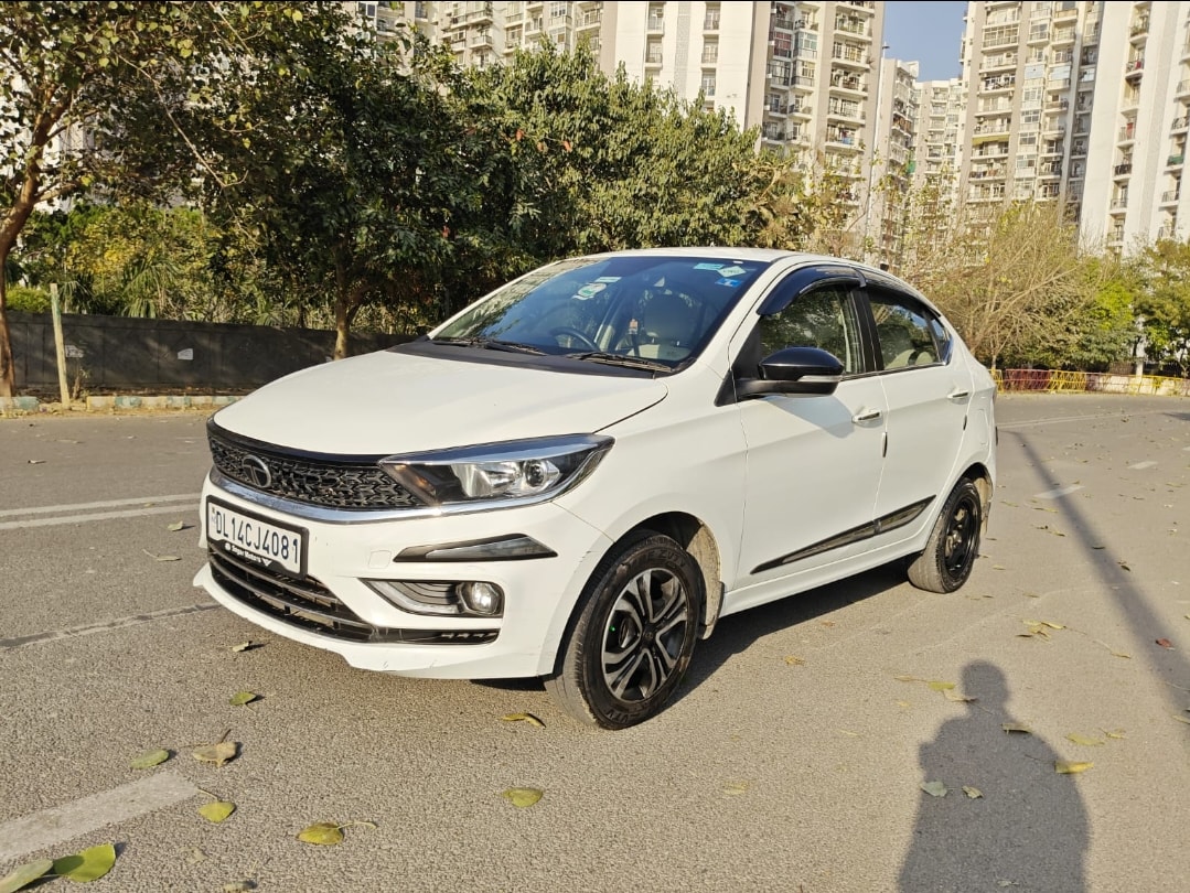 Tigor image 1 Tigor image 1